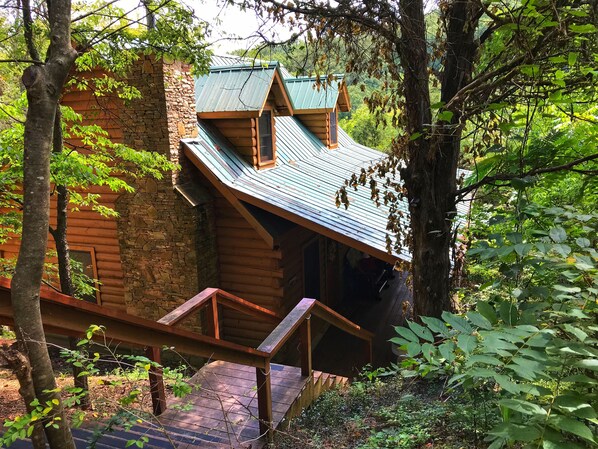 Hidden Haven is a beautiful custom built cabin tucked into the woods