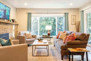 Gather for conversations or to watch the big game in the Living Room.