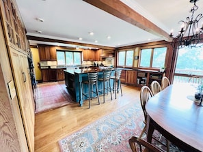 Kitchen and breakfast bar opens up to dining room