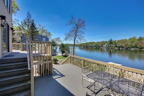 Patio Table and Chairs on the Deck Overlooking Lake.