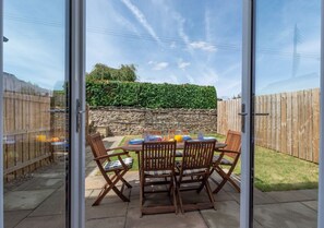 The view through the French windows from the dining area of the kitchen.