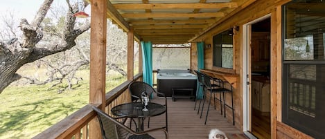 Large porch with a hot tub and grill all to yourself