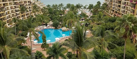 View of Ocean, 3 pools, and K ids Play area