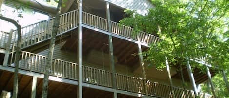 View of the house looking up from the trail below.