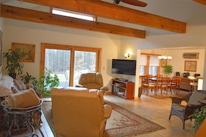 Welcome to Hidden Cedar Inn’s East Wing Living Room, Meeting Room, & Patio view.