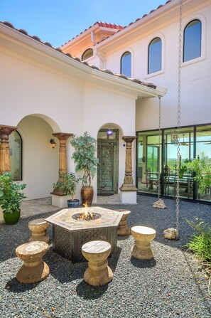 Gather around the fire in this zen rock garden