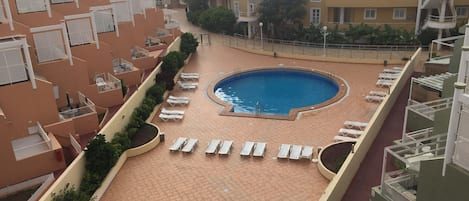 View from our balcony overlooking the small complex pool