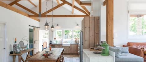 The open kitchen area with antique tiling 