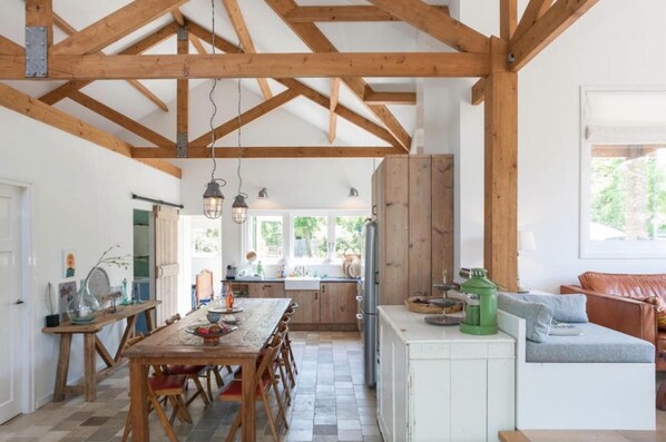 The open kitchen area with antique tiling 