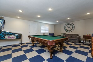 Game room with Pac Man Table and plenty of room to hang out