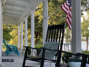 The porch overlooks the lake, protects you from the rain and has a ceiling fan.