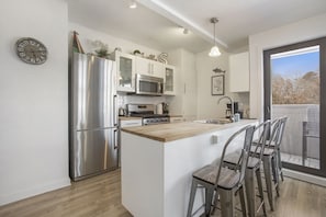 The kitchen comes fully stocked with dishes, silverware  and spices for cooking