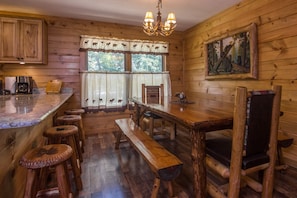 Beautiful 7 Ft. Log Table w/2 Benches, 2 Large Chairs. & 4 Log Bar Stools.