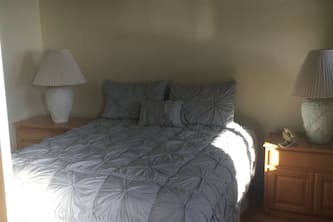Bungalow 1 with large kitchen, outdoor private shower and 1/2 bath.