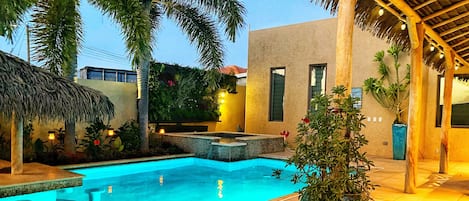 Private pool surrounded by tropical gardens.  You may not want to leave :)
