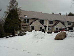 Front View of Condo - Winter. Parking in front of unit w/ short walk to door.