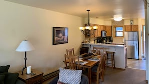 Comfortable floor plan with counter and table dining. 