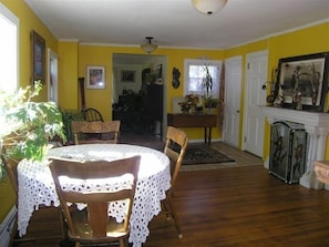 Dining-room open onto the River, the Living-Room, the bar/Kitchen & the Library.