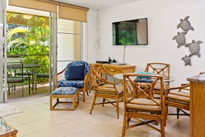 Lanai view from living area, dining area seats four