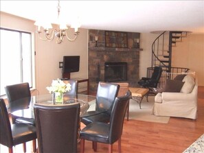 Main Living and Dining Area with wood burning fireplace