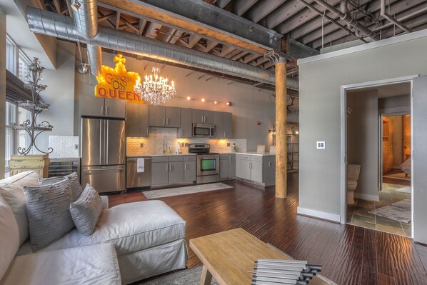 Spacious living room/kitchen combo with access into the Jack and Jill bathroom.
