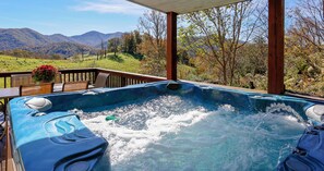 Enjoy a glass of wine while relaxing in the hot tub. Seats up to 7 people