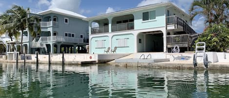 View from canal; 80ft seawall; Step-down seawall for easy access to boat; Pool