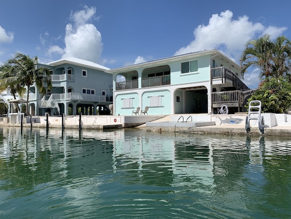 View from canal; 80ft seawall; Step-down seawall for easy access to boat; Pool