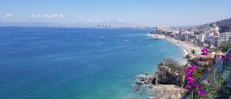 Sweeping panoramic blue ocean and Banderas Bay  view from terrace