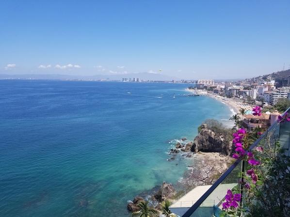 Sweeping panoramic blue ocean and Banderas Bay  view from terrace