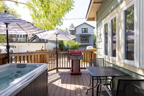 Private deck with hot tub, seasonal propane, and dining table