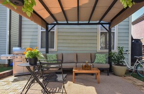 Remember to turn your steaks and burgers while you relax under the Pergola.