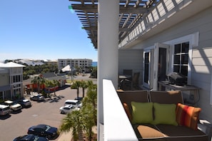 Water view and double-width balcony; Electric grill and dining area too