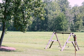 play area with charcoal grill and outdoor firepit