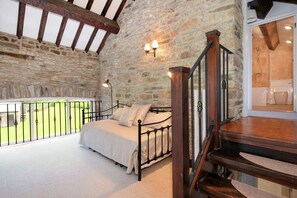 Gallery with pull out trundle bed to sleep two on twin beds. Screen for privacy.