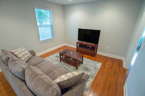 Living Room with Super Comfy Sofy and 55 Inch Flat Screen TV