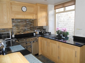 cook in our well equipped luxury kitchen with granite worktop and range cooker.