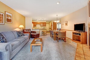 View of open floor plan living room and flat screen TV