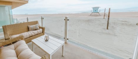 Stunning view from back deck, you are on the sand!  Watch the sunset here!