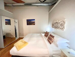 The 2nd bedroom is located off of the kitchen area which has a king bed and access to the Jack and Jill full bathroom.
