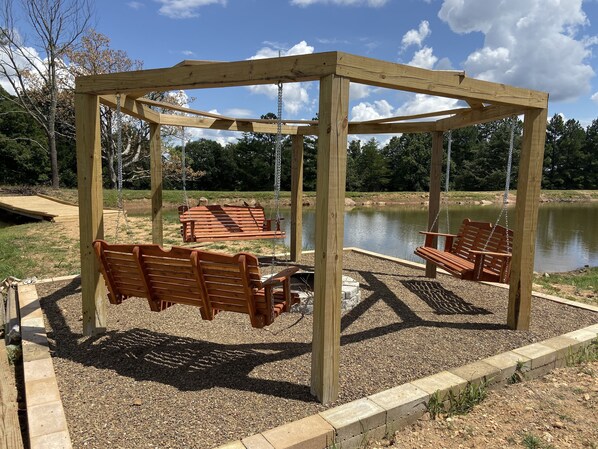 Enjoy the fire pit next to the pond!