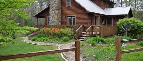 Four acres of wooded privacy and beautiful gardens