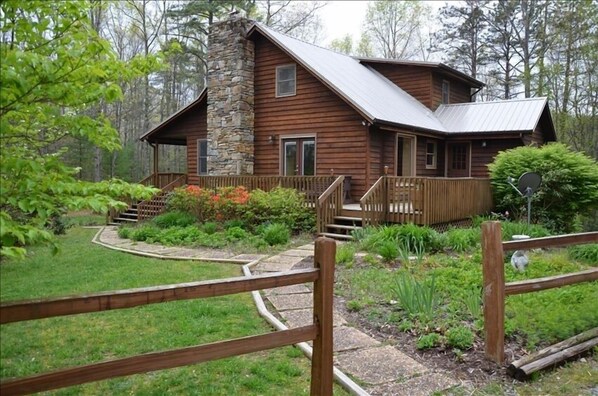 Four acres of wooded privacy and beautiful gardens