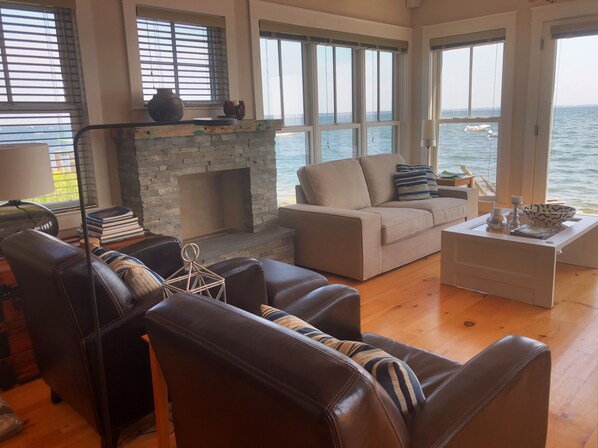 Living room with breathtaking views up the beach in both directions