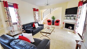 Living area is tastefully furnished for luxury stays.