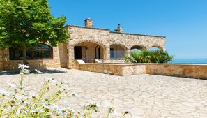 Villa Francesca from entrance courtyard with seaviews beyond