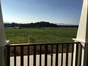 The view from the front porch. Savor a cup of coffee at the little cafe table.