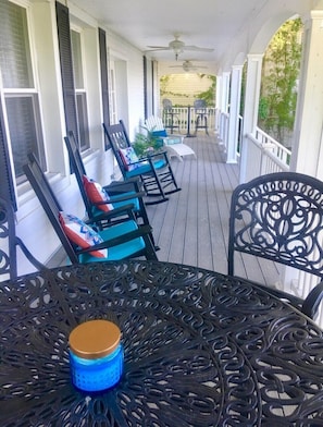 Large wrap around porch with plenty of seating.