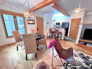 View of the dining area, Bar seating and Kitchen