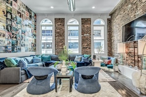 Spacious living room with two queen sleeper sofas